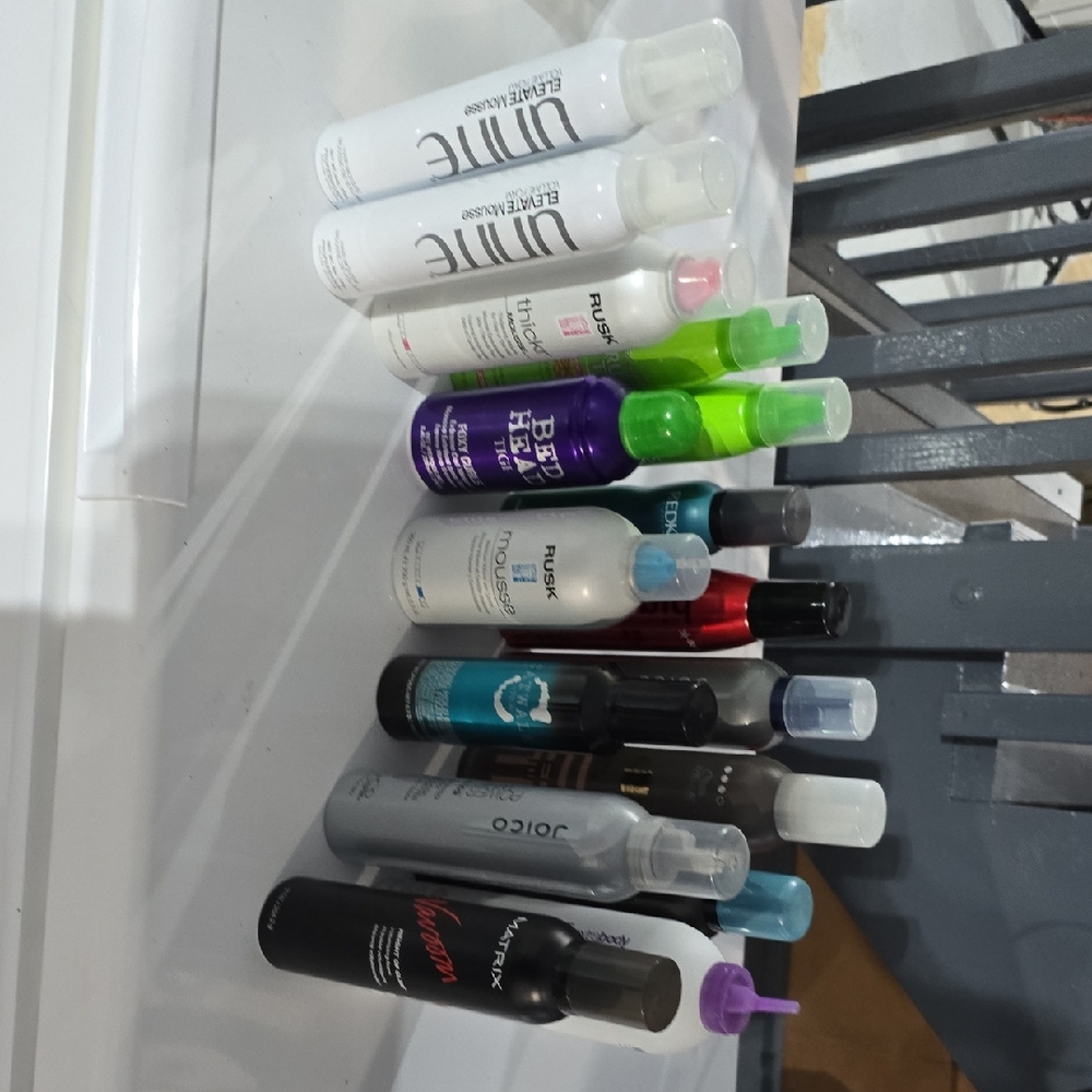 16 Cans Of Misc. mousse.  90% Of Them Are full Cans.